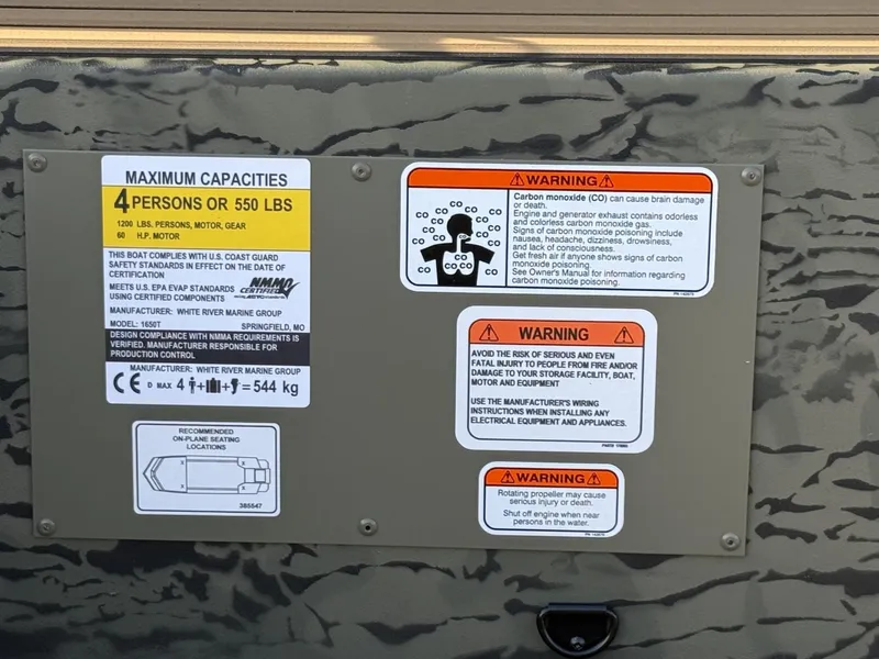 Slide: The Image of Safety and capacity labels on 2025 Tracker Grizzly 1650 T Prairie Wings Edition boat. - 10