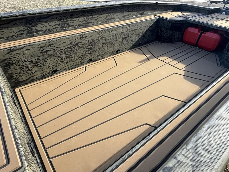 Slide: The Image of 2025 Tracker Grizzly 1650 T Prairie Wings Edition boat interior with camouflage design. - 13