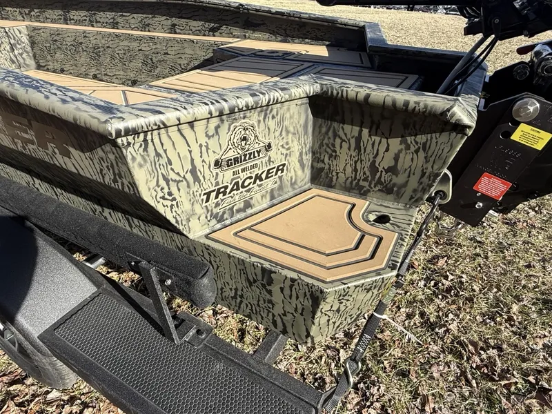 Slide: The Image of 2025 Tracker Grizzly 1650 T Prairie Wings Edition boat with camouflage design. - 14