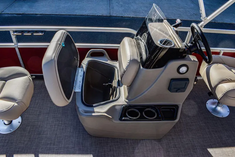 Slide: The Image of 2025 Sun Tracker Bass Buggy 16 XL Select boat interior with open storage compartment. - 3