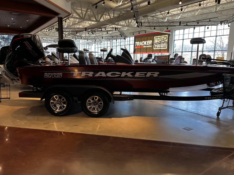 The Image of 2025 Tracker Savage 215 boat displayed indoors on a trailer. - 0