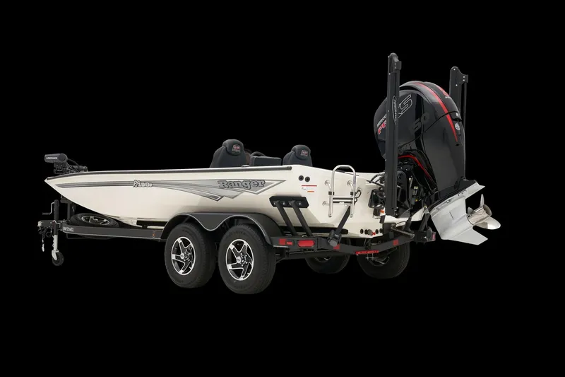 Slide: The Image of 2025 Ranger RT198P fishing boat with dual axle trailer, side view on black background. - 7