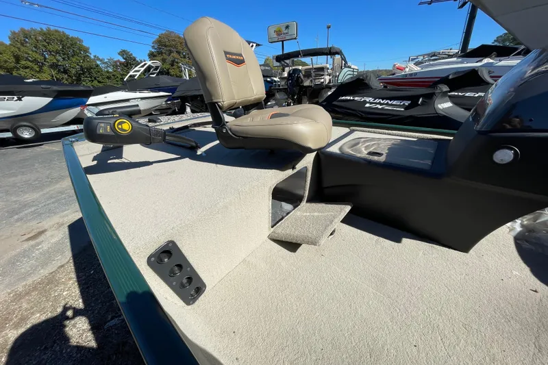 Slide: The Image of 2025 Tracker Bass Tracker Classic Limited boat interior with seating and controls. - 42