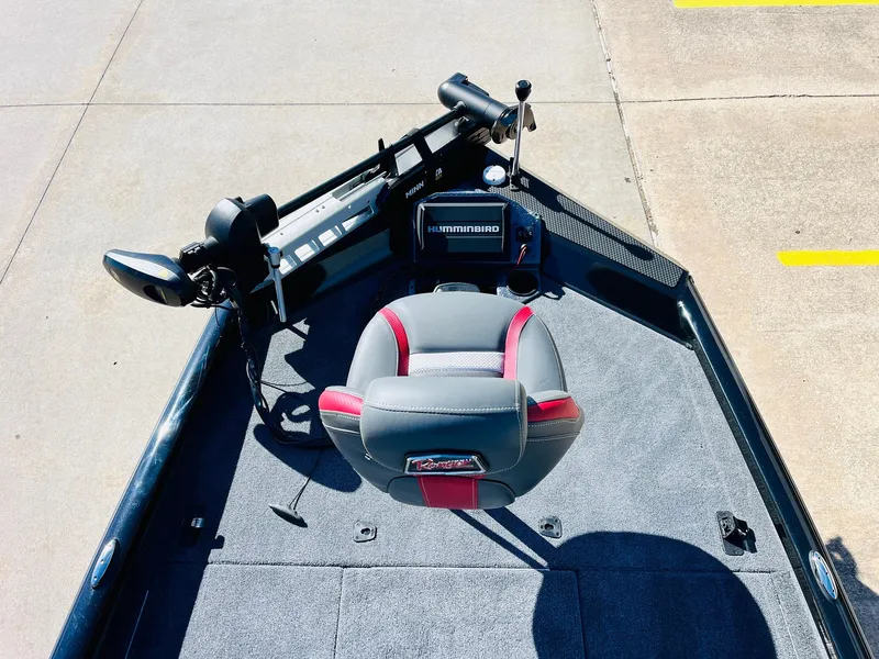 Slide: The Image of 2024 Ranger RT198P boat interior with steering and seating area. - 10