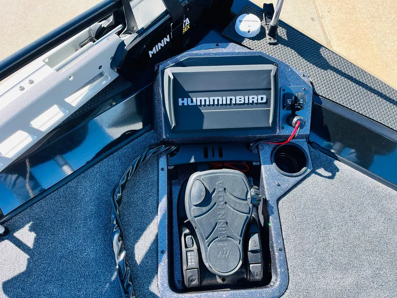 Slide: The Image of 2024 Ranger RT198P boat dashboard with Humminbird fish finder and foot pedal controls. - 12