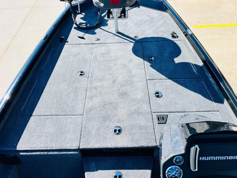 Slide: The Image of 2024 Ranger RT198P boat deck with Humminbird electronics, featuring spacious storage compartments. - 14