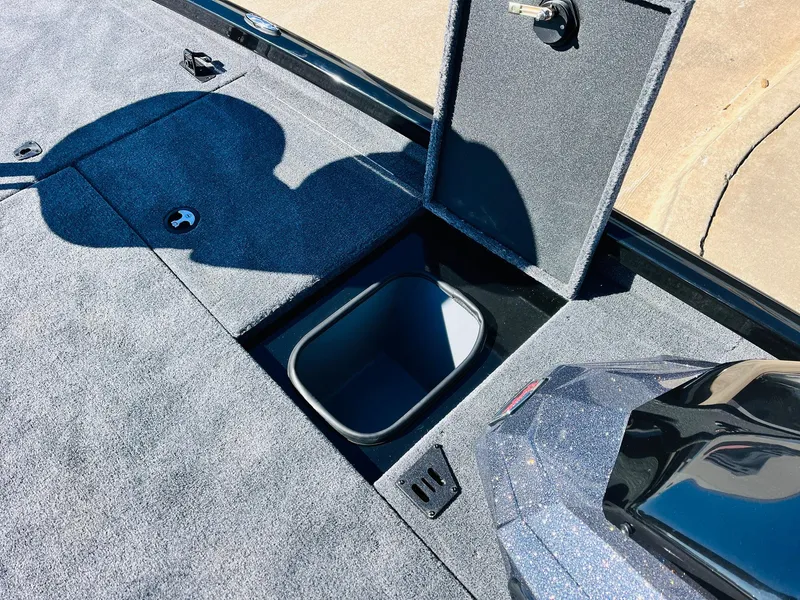 Slide: The Image of 2024 Ranger RT198P boat with open storage compartment on deck. - 21