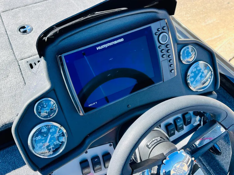 Slide: The Image of 2024 Ranger RT198P dashboard with Humminbird display and gauges. - 30