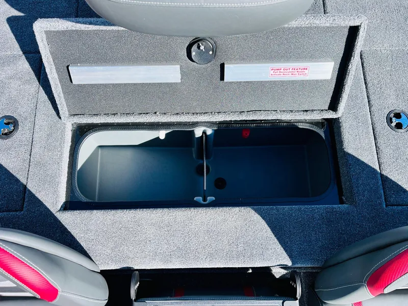 Slide: The Image of 2024 Ranger RT198P boat storage compartment with open lid, showcasing interior space. - 33