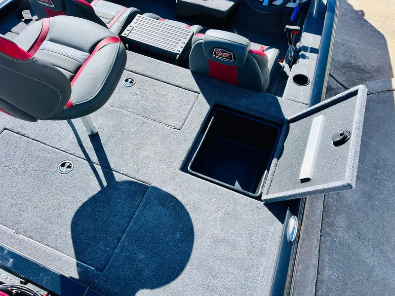 Slide: The Image of 2024 Ranger RT198P boat interior with open storage compartment and seating. - 40