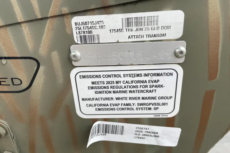 Slide: The Image of 2025 Tracker Grizzly 1754 SC emissions control label on boat hull. - 36