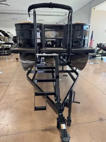 Slide: The Image of 2025 Barletta Lusso L25UC pontoon boat on trailer in showroom. - 3