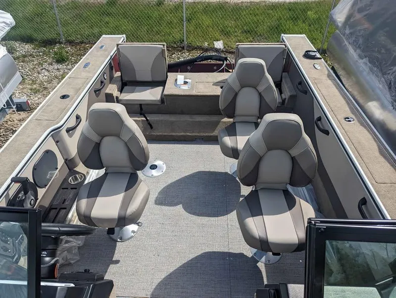 Slide: The Image of 2024 Alumacraft Trophy 185 boat interior with four seats and spacious layout. - 8