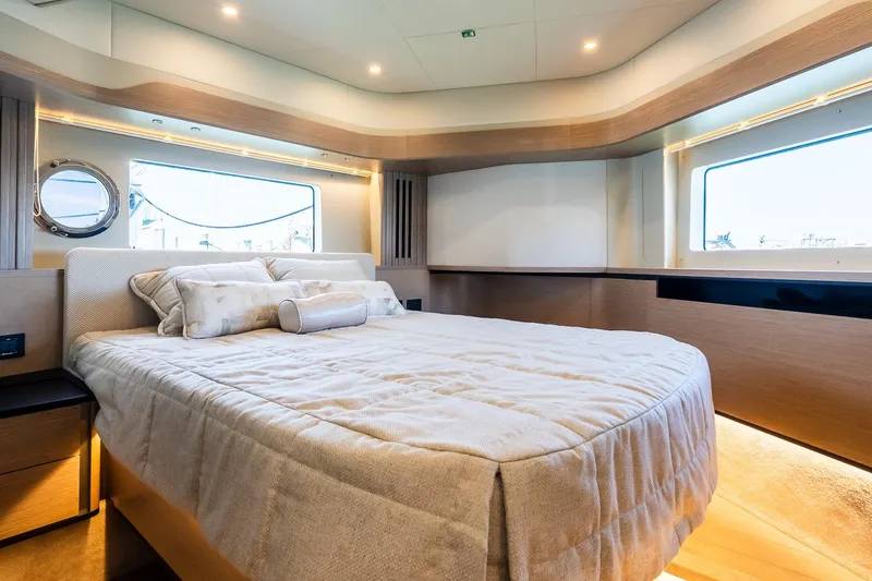 Slide: The Image of Luxurious bedroom interior of 2026 Absolute Navetta 53 yacht with modern design. - 28