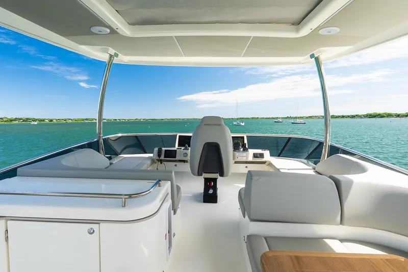 Slide: The Image of Luxurious 2026 Absolute Navetta 53 yacht interior with scenic ocean view. - 50