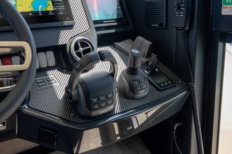 Slide: The Image of Control panel of 2026 Absolute Navetta 53 yacht with advanced navigation systems. - 26
