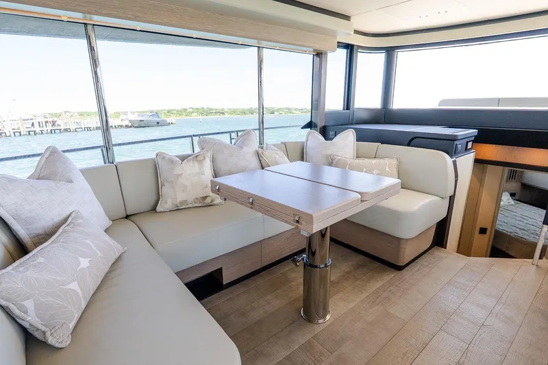 Slide: The Image of Luxurious interior of 2026 Absolute Navetta 53 yacht with elegant seating and scenic views. - 20