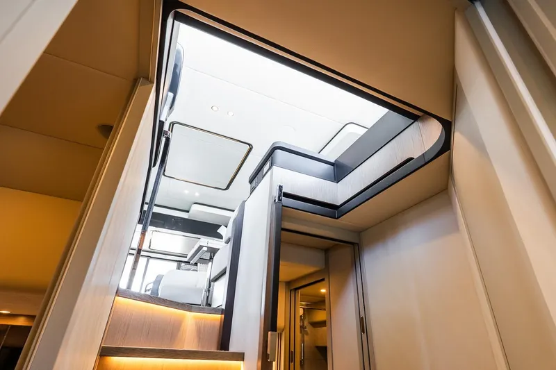 Slide: The Image of Luxurious interior of 2026 Absolute Navetta 53 yacht, featuring modern design and elegant lighting. - 37