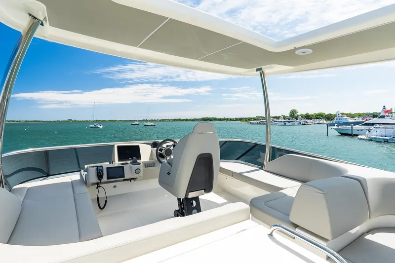 Slide: The Image of Luxurious 2026 Absolute Navetta 53 yacht interior with scenic ocean view. - 52