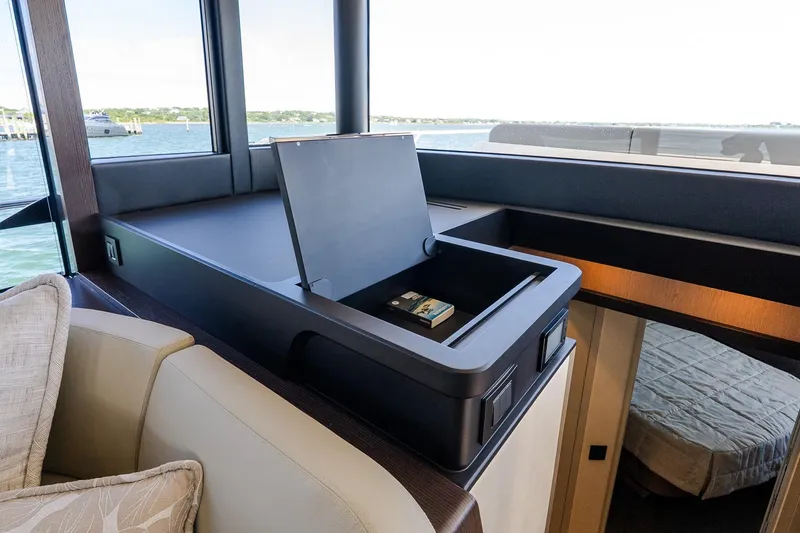 Slide: The Image of Interior of 2026 Absolute Navetta 53 yacht with modern storage compartment. - 21