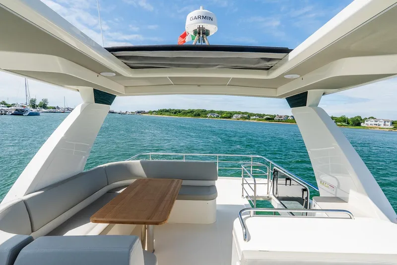 Slide: The Image of Luxurious 2026 Absolute Navetta 53 yacht with spacious deck and scenic ocean view. - 45