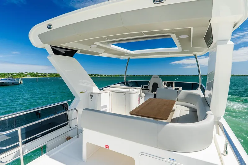 Slide: The Image of Luxurious 2026 Absolute Navetta 53 yacht with spacious deck and stunning ocean view. - 42