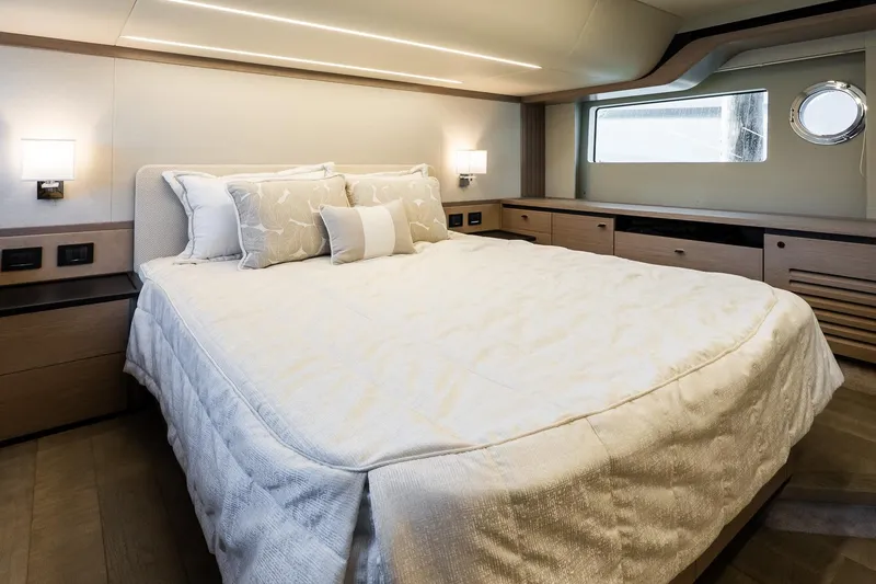 Slide: The Image of Luxurious bedroom interior of 2026 Absolute Navetta 53 yacht with elegant bedding and modern lighting. - 31