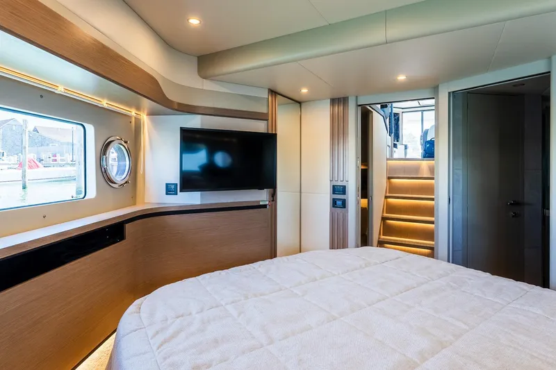 Slide: The Image of Luxurious interior of 2026 Absolute Navetta 53 yacht with modern design and cozy ambiance. - 27