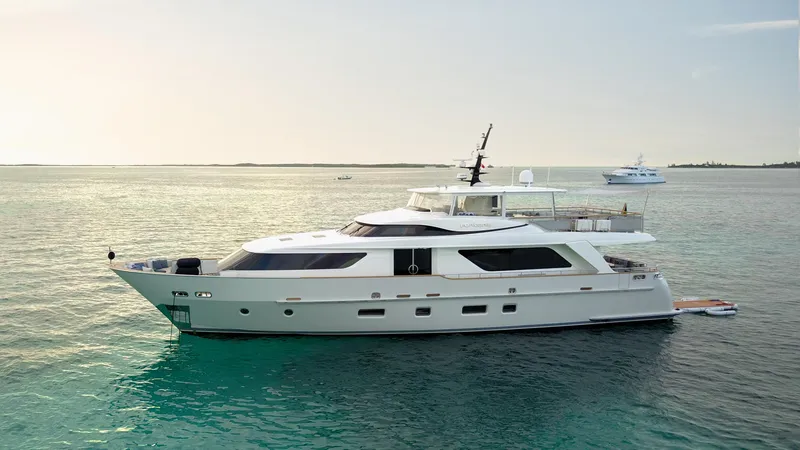 The Image of Luxurious 2012 Sanlorenzo SD92 yacht cruising on serene waters at sunset. - 0