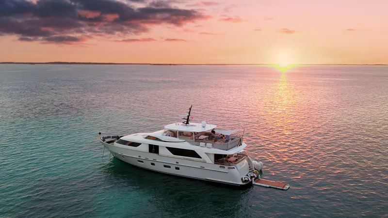 Slide: The Image of Sanlorenzo SD92 yacht at sunset, 2012 model, cruising on tranquil waters. - 1