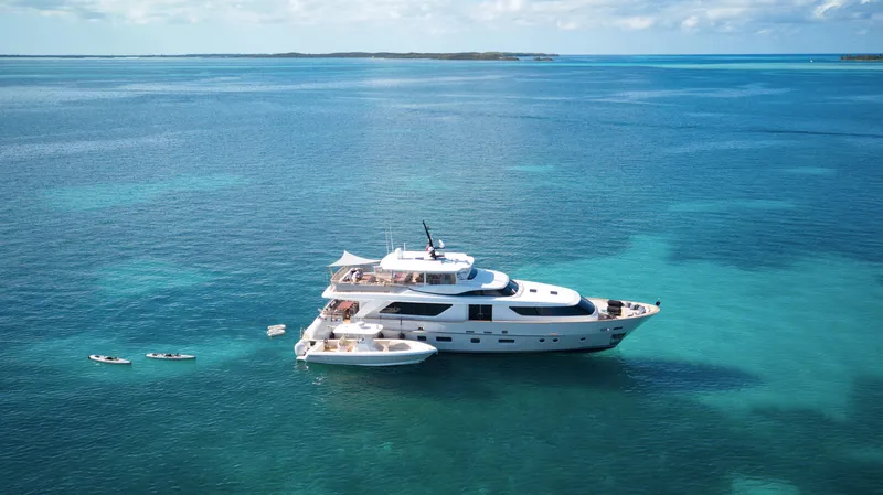 Slide: The Image of Sanlorenzo SD92 yacht from 2012 cruising in clear blue ocean waters. - 11