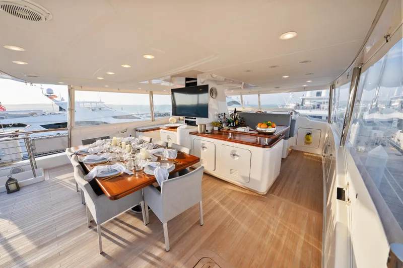Slide: The Image of Luxurious 2012 Sanlorenzo SD92 yacht interior with elegant dining area and modern amenities. - 18