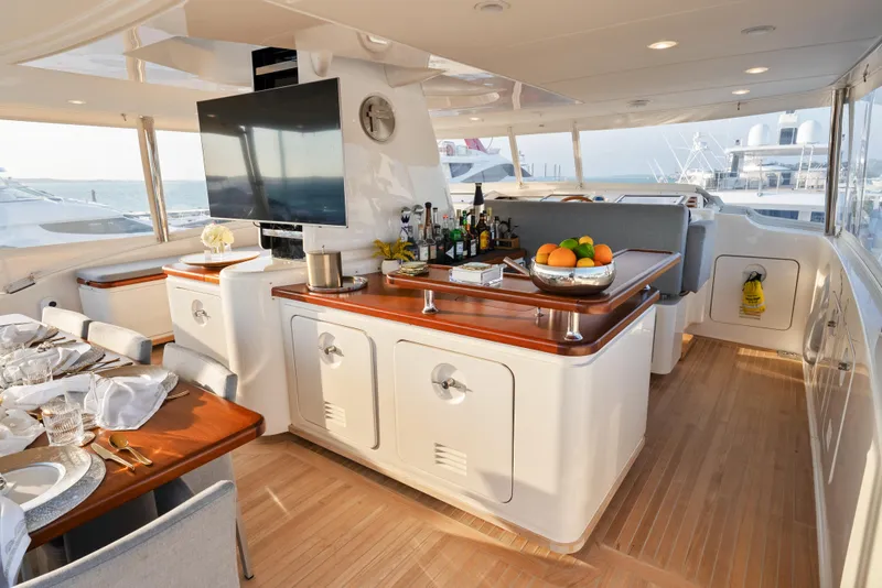 Slide: The Image of Luxurious interior of 2012 Sanlorenzo SD92 yacht with elegant dining and bar area. - 19