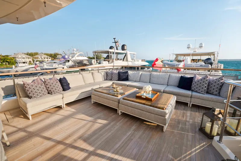 Slide: The Image of Luxurious 2012 Sanlorenzo SD92 yacht deck with elegant seating and ocean view. - 38
