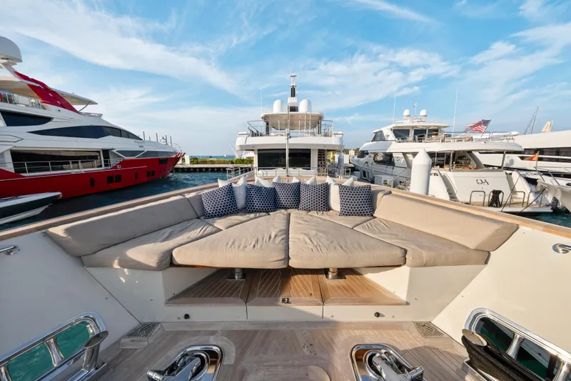 Slide: The Image of Luxurious 2012 Sanlorenzo SD92 yacht with spacious deck seating, docked at marina. - 44
