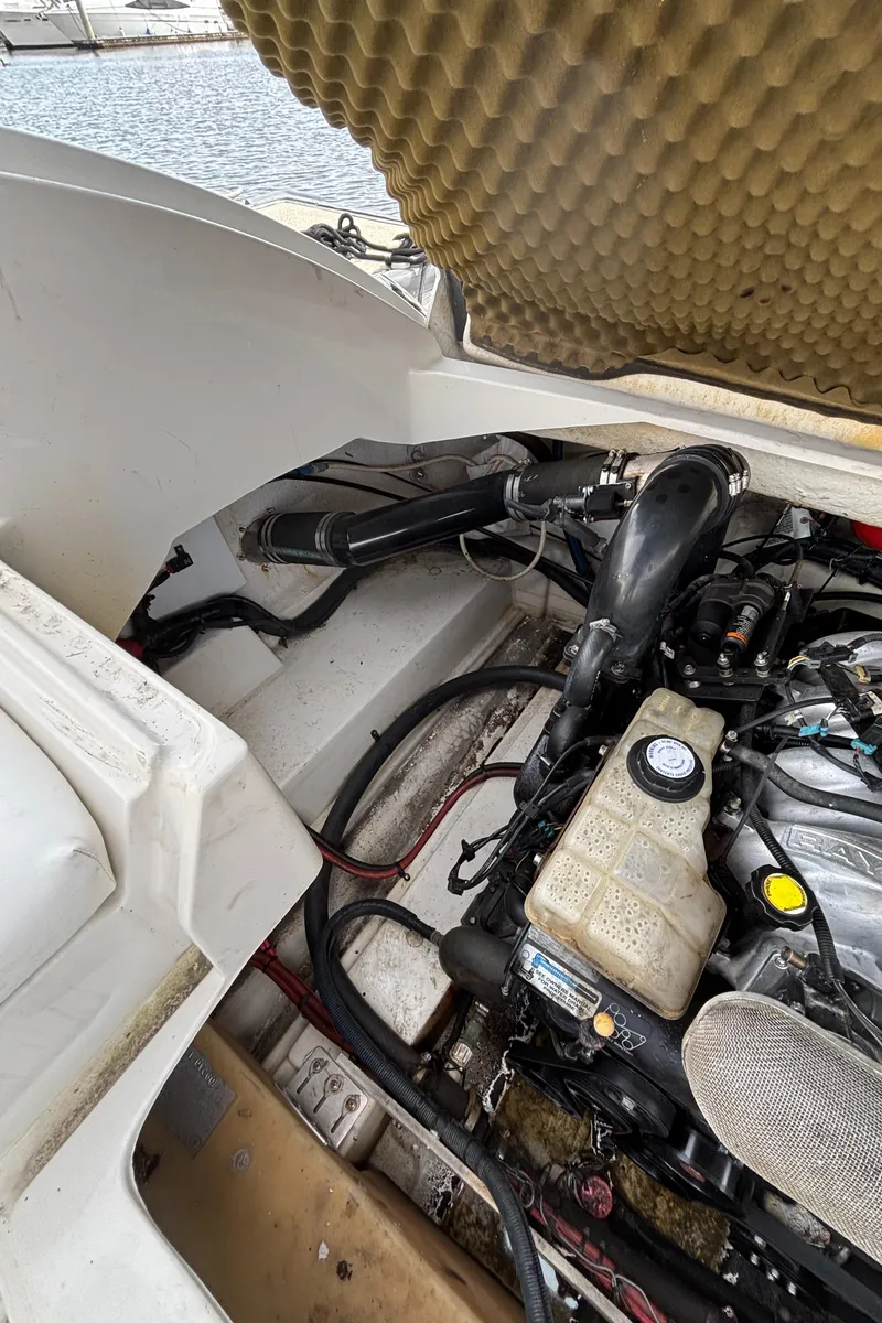 Slide: The Image of Engine compartment of a 2008 Sea Ray 290 Sundeck boat, showing detailed components. - 43