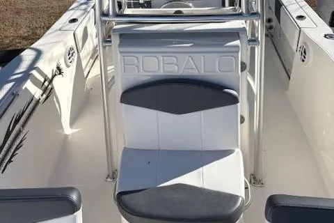 Slide: The Image of 2021 Robalo R200 Center Console boat interior with seating and console details. - 10