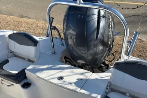 Slide: The Image of 2021 Robalo R200 Center Console boat with powerful outboard motor. - 4