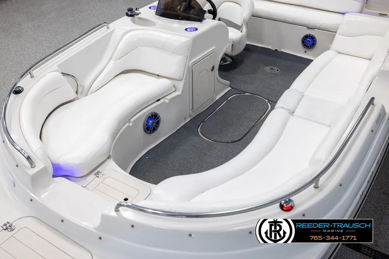 Slide: The Image of 2015 Starcraft 1915 Limited OB boat interior with white seating and modern design. - 10