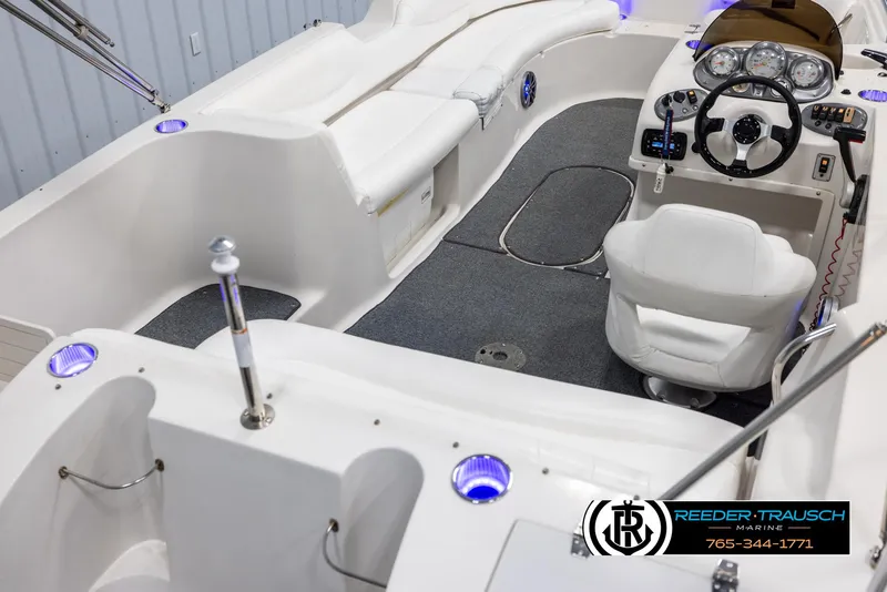 Slide: The Image of 2015 Starcraft 1915 Limited OB boat interior with seating and steering console. - 12