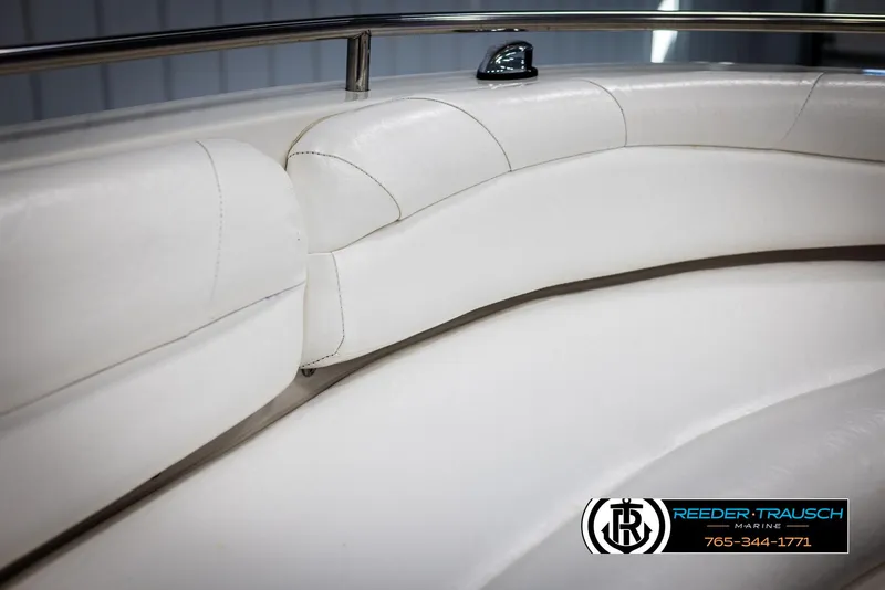 Slide: The Image of 2015 Starcraft 1915 Limited OB boat interior with white seating and railing. - 36