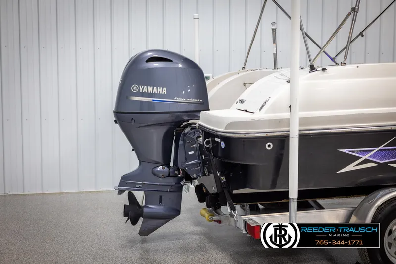 Slide: The Image of 2015 Starcraft 1915 Limited OB boat with Yamaha outboard motor in a showroom. - 41