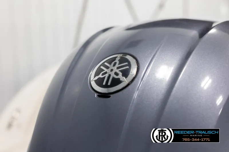 Slide: The Image of 2015 Starcraft 1915 Limited OB boat with Yamaha engine cover, Reeder-Trausch Marine logo. - 44