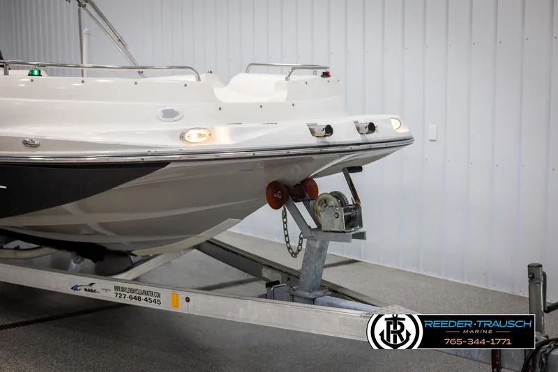 Slide: The Image of 2015 Starcraft 1915 Limited OB boat on trailer in indoor storage. - 47