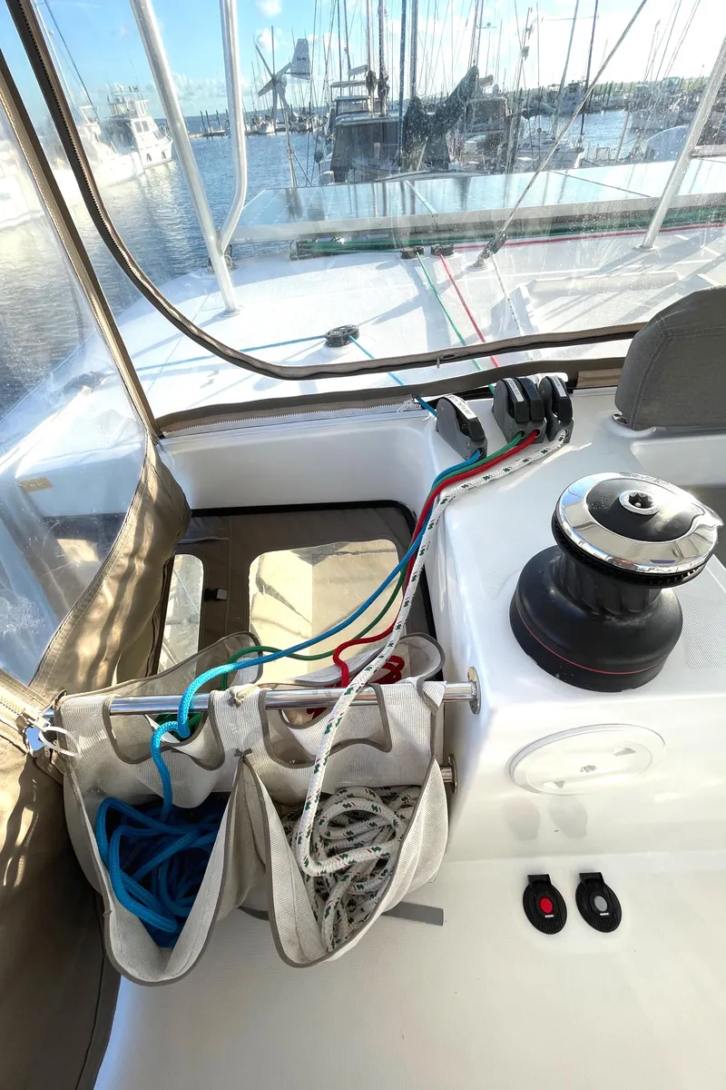 Slide: The Image of Cockpit view of 2016 Lagoon 450 F sailboat with ropes and winch. - 30