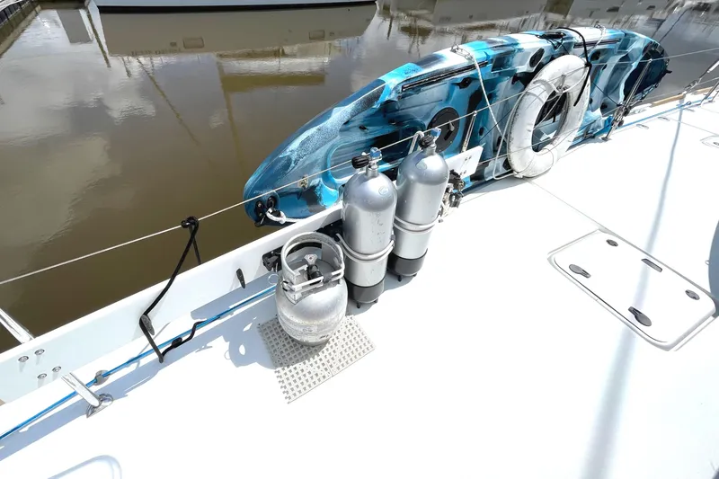 Slide: The Image of Deck of 2016 Lagoon 450 F with kayaks and scuba tanks. - 33