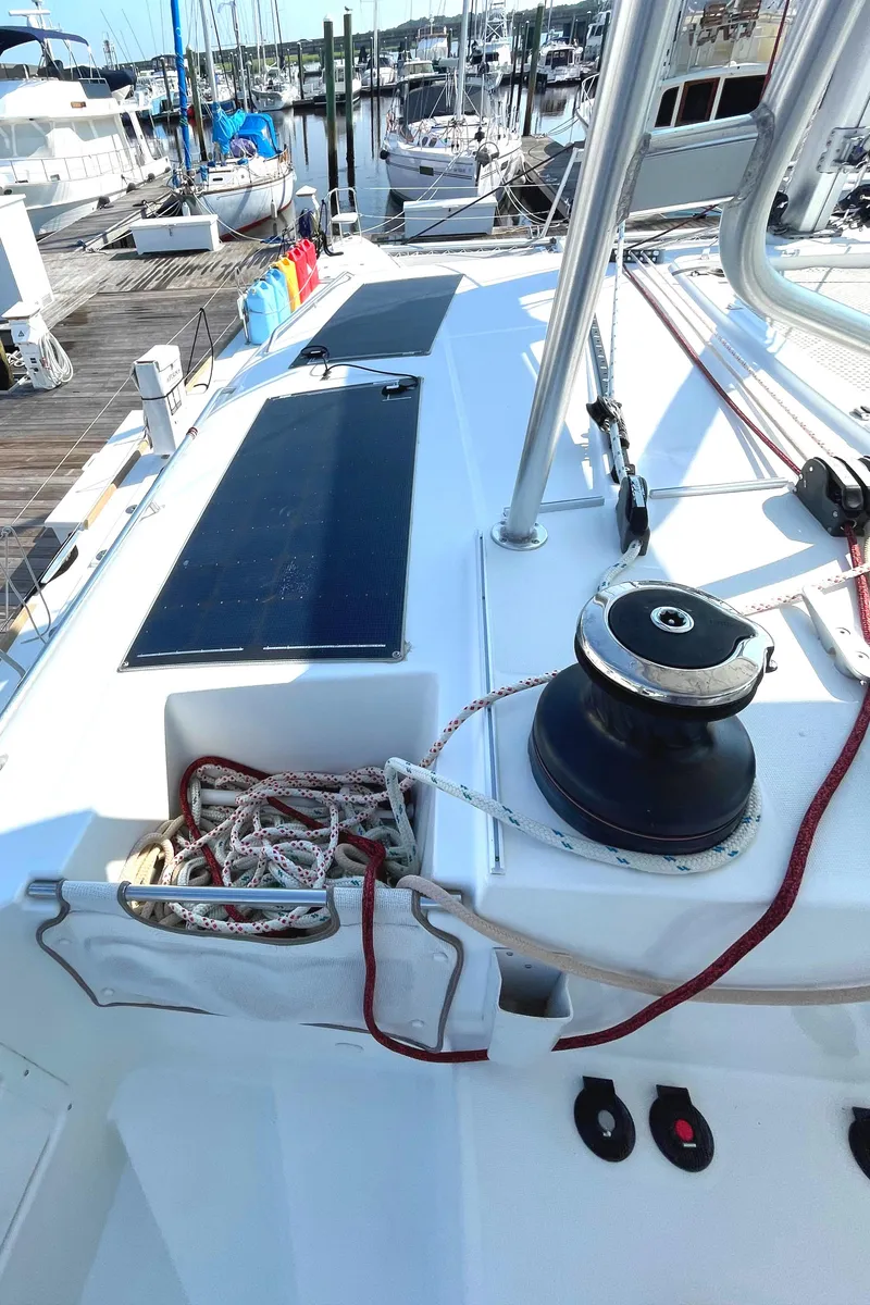 Slide: The Image of Deck view of a 2016 Lagoon 450 F catamaran with ropes and winch. - 40