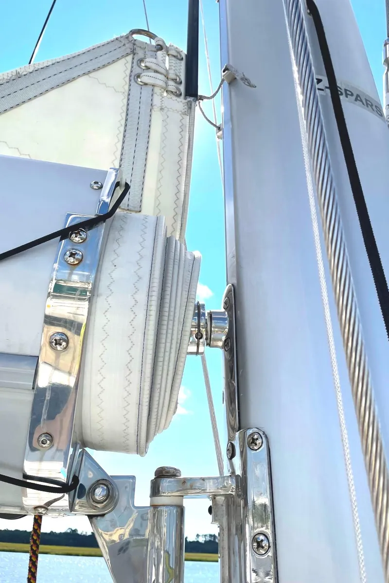 Slide: The Image of Close-up of a 2016 Lagoon 450 F sailboat mast and sail rigging. - 41
