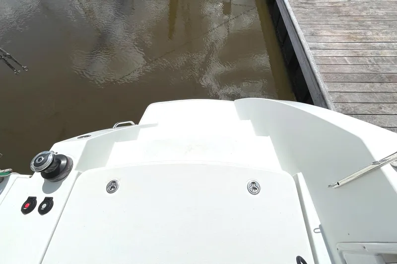 Slide: The Image of Stern view of 2016 Lagoon 450 F catamaran docked at marina. - 46