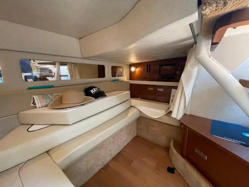 Slide: The Image of Interior of 2010 Sea Ray 350 Sundancer yacht with cozy seating and modern amenities. - 46